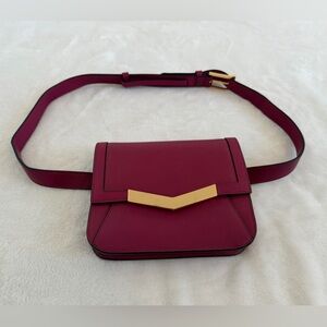 Time’s Arrow Leather Belt Bag. Purple/pink hue with gold accents.  Never used.